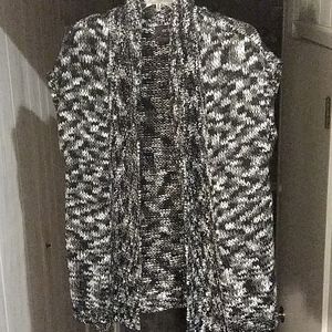 Knit long sleeveless cardigan